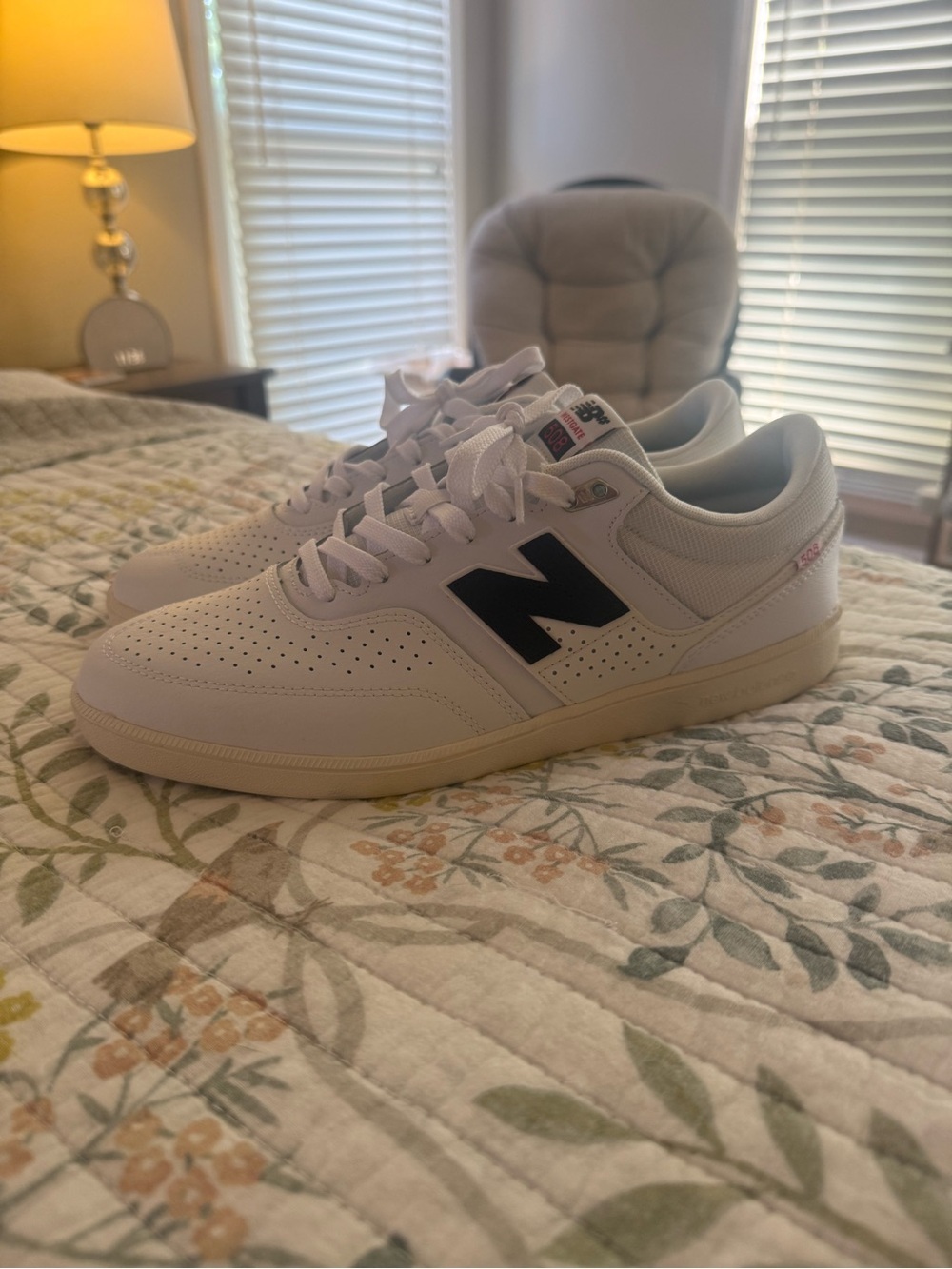 New Balance Men's White Leather Sneakers with Black N Logo